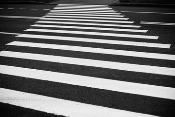 road markings on a pedestrian crosswalk. pedestrian crosswalk close-up. black and white road markings