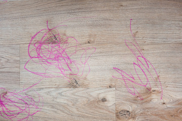 Marker colored onto hardwood floor
