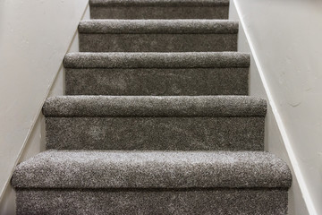 New grey carpet on stairs