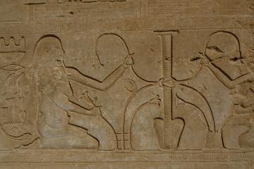 Egyptian ancient pictures on the stone wall