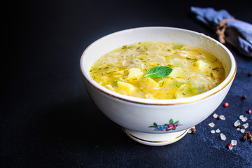 soup vegetables and pasta alphabet, peas, corn Menu concept healthy eating. food background top view copy space for text table setting keto or paleo diet organic