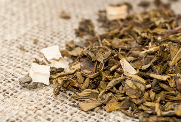 dried tea leaves on burlap