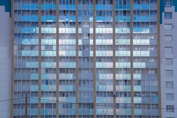 Fototapeta na wymiar Sale of new apartments in new multi-storey high-rise buildings in the city.