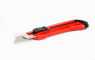 Red office knife on a white background