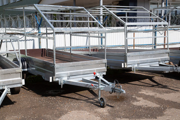 Car open trailer.A store that sells car trailers. Repair and maintenance of trailers for passenger cars.