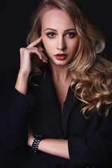 Obraz premium Attractive Blonde Business Woman in Suit, mystery, vampire eyes