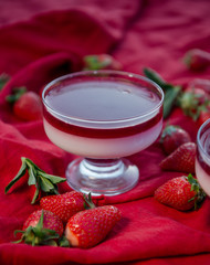 Fresh strawberry jelly on old wooden background. Tasty healthy vegetarian dessert sugar free. 
