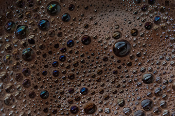 Closeup of a chocolate foam surface
