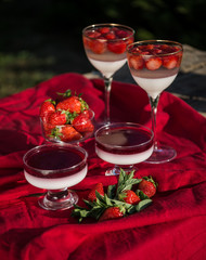 Fresh strawberry jelly on old wooden background. Tasty healthy vegetarian dessert sugar free. 
