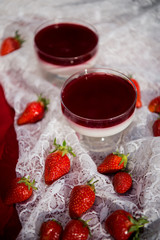 Fresh strawberry jelly on old wooden background. Tasty healthy vegetarian dessert sugar free. 
