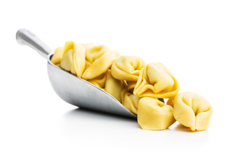 Tortellini pasta. Italian stuffed pasta in scoop.