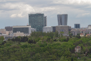 Fototapeta premium views of Prague on the roofs of buildings and traffic during the spring day