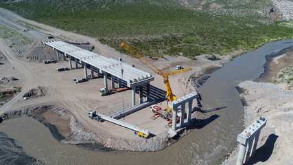 Mendoza, Argentina, April 23, 2018: Construction of a highway bridge over the Rio Diamante.