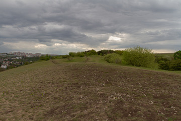 Obraz premium views of Prague on the roofs of buildings and traffic during the spring day