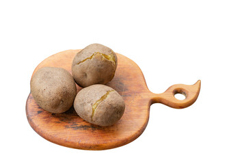 Fototapeta premium Boiled unpeeled potatoes on a cutting Board