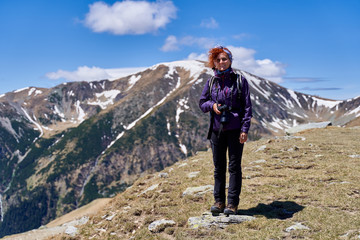 Hiker lady with camera
