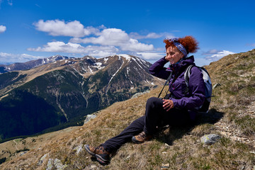 Hiker lady with camera