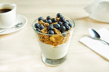 Healthy breakfast yogurt with granola and blueberries