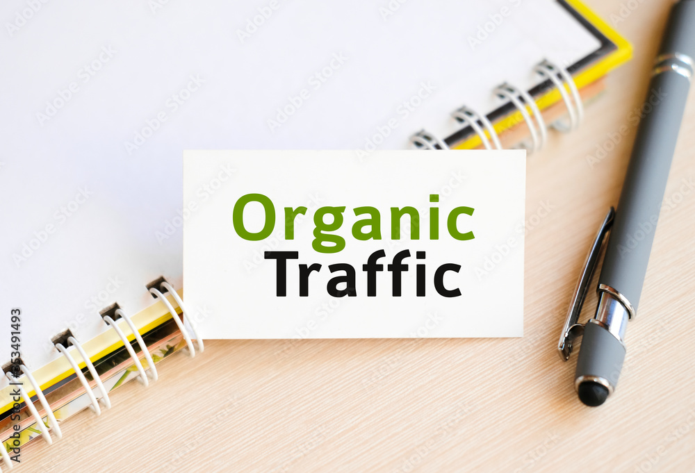Aufkleber organic seo traffic - text on a notebook with a spring and a gray handle