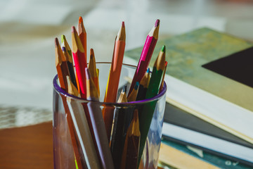 Obraz premium School things close-up: colored pencils, books, notebooks