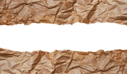 Fototapeta na wymiar old crumpled craft paper on an isolated white background with copy 