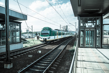 Naklejka premium Train arriving station