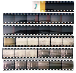 set of real long 35mm positive strips on white background, contact sheet with empty frames or film...