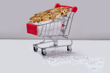 Robbery of a jewelry store. Crystal gems spilling out of a supermarket trolley and brass knuckles...