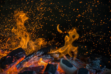 Yellow and Orange Fireball, heating up the black background.
