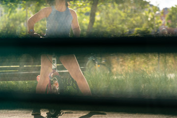 girl at the park in her bicycle