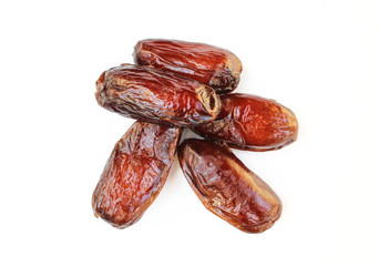 Pile of tasty dry dates isolated on white background. Arabic food