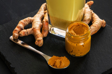 turmeric paste with golden milk and turmeric root
