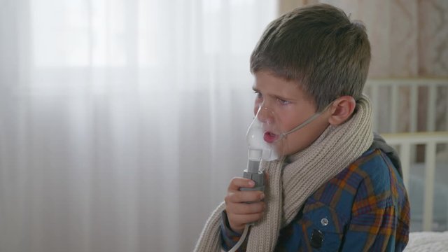 health care, a child with poor health suffers from coughing or plevmonia uses a nibulizer to remove macoroth from lungs