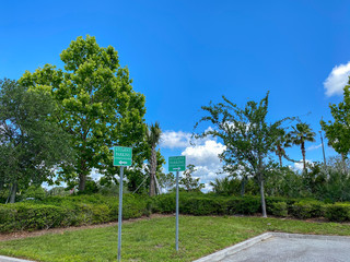 A student parking sign in a parking lot © Joni