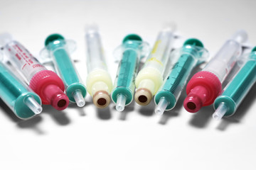 Syringes without needles lying in semicircle