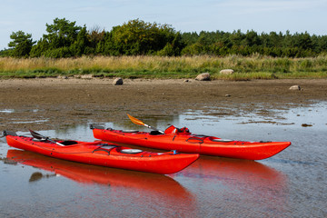 Sea kayaking in sunny day near Vormsi island