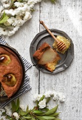 Traditional fruit cake with whole pears . Homemade seasonal dessert.  pear cake view from the top.