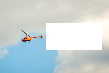 yellow helicopter high in the sky with a white canvas under the mockup. Horizontal frame