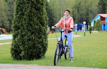 woman on bicycle on vacation