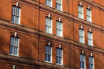 Fototapeta na wymiar red brick façade of Victorian building