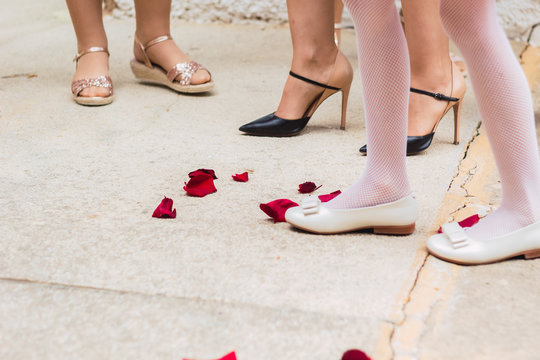 Women's feet at a wedding in dress shoes