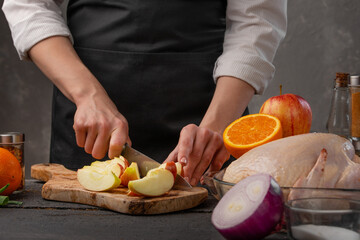 Chef prepares a dish by slicing fresh apples. Cooking food, tasty and proper nutrition, recipes