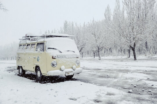 ARGENTINA, JUNE 2019: Classic combi covered with snow of the route