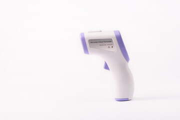 digital infrared thermometer in white background