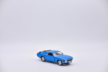 Fototapeta na wymiar blue toy car on white background