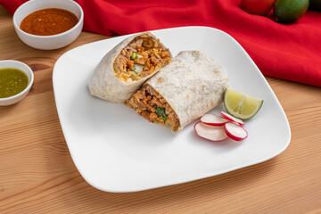Chicken and rice burrito. Delicious and authentic Mexican food. 