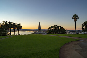 Early morning sunrise over the war memorial in Kings Park. Beautiful golden light is hitting the empty monuments. 