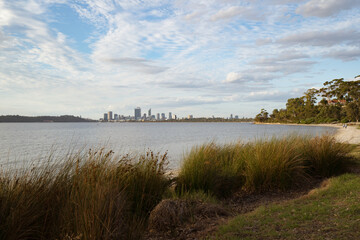 Golden sunrise over the Perth city center. A beautiful light catching the buildings as people start their day. 