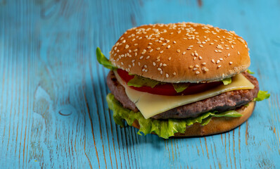 burger on a blue wooden background