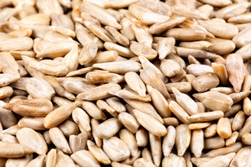 A close up  of sunflower kernels isolated on a wooden background